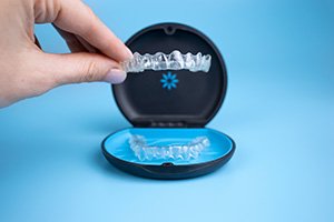 New Invisalign in Collierville in official carrying case on blue background