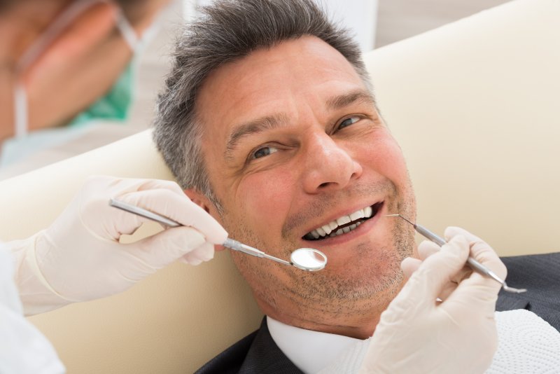 Man smiling in the dental chair